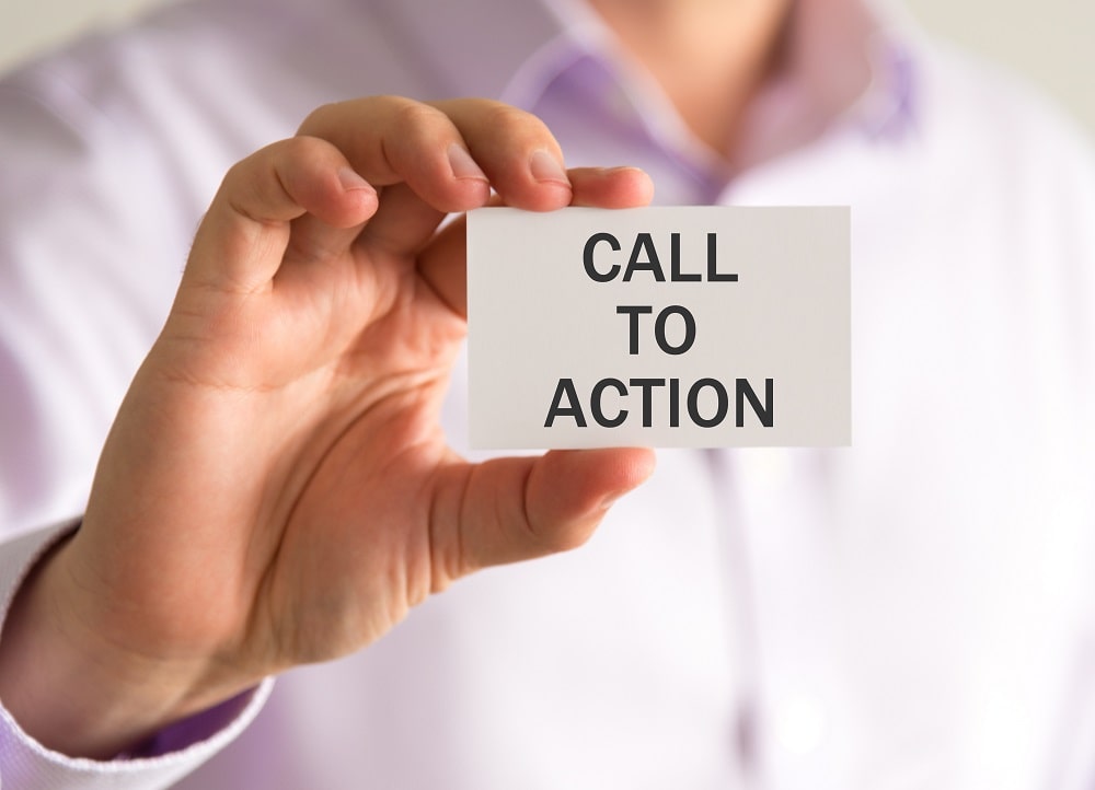 man holding a card with text that says Call to Action