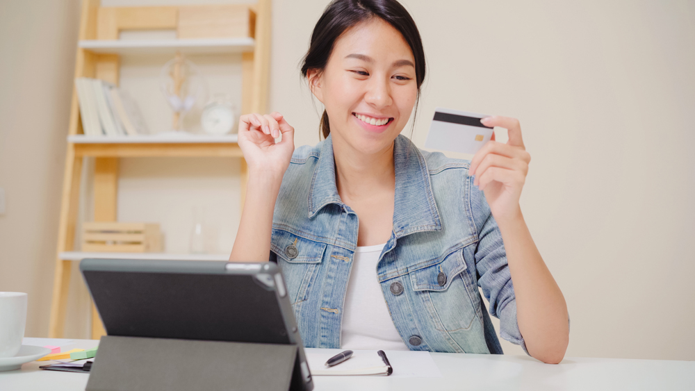 woman using tablet buying online shopping