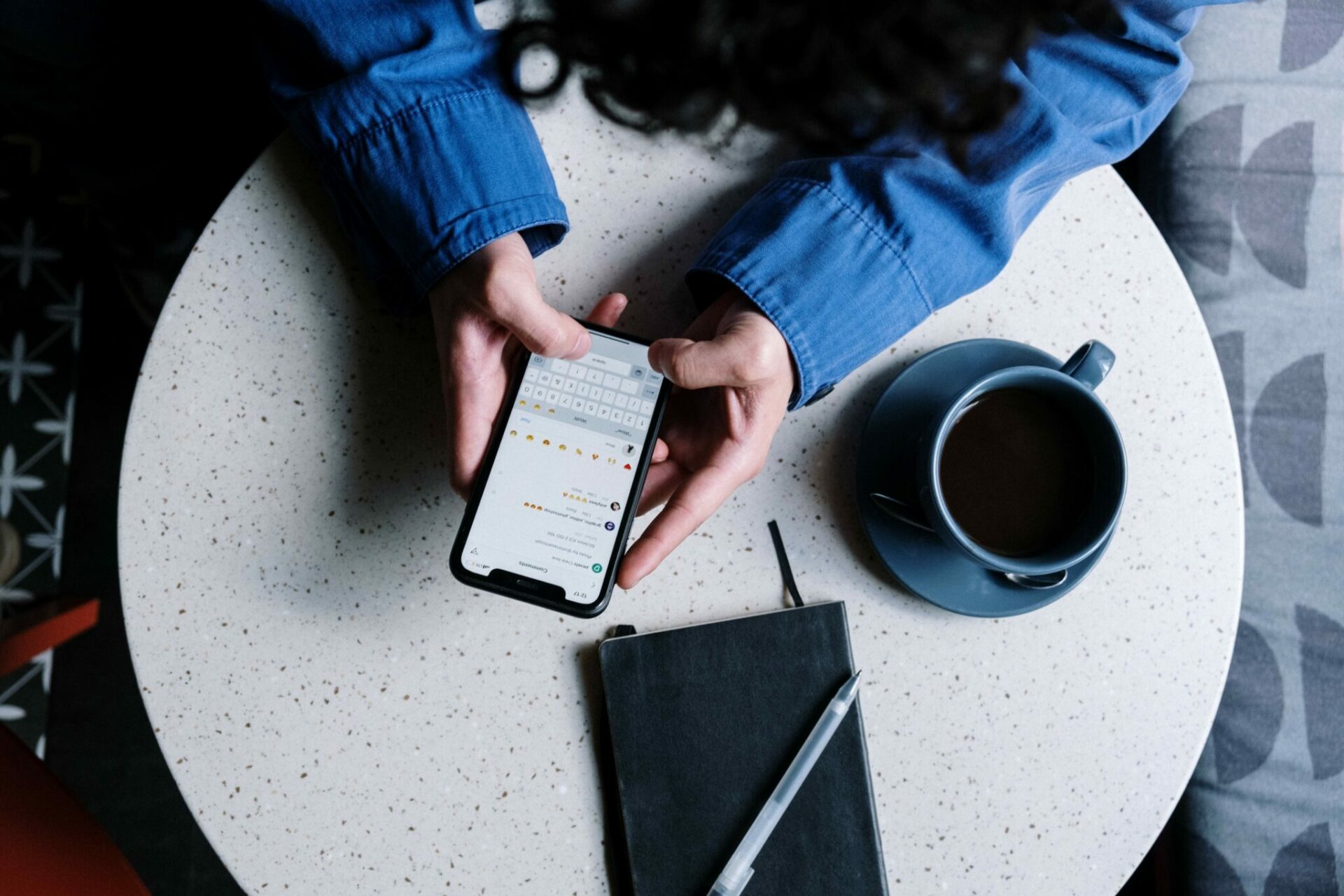 person using instagram in a cafe