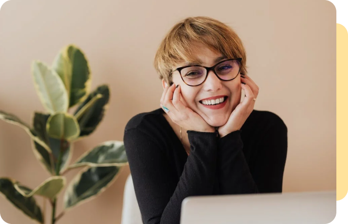 woman brightly smiling