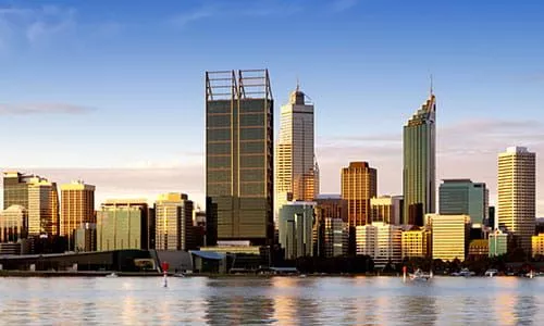 landscape image of buildings in Perth at dusk time