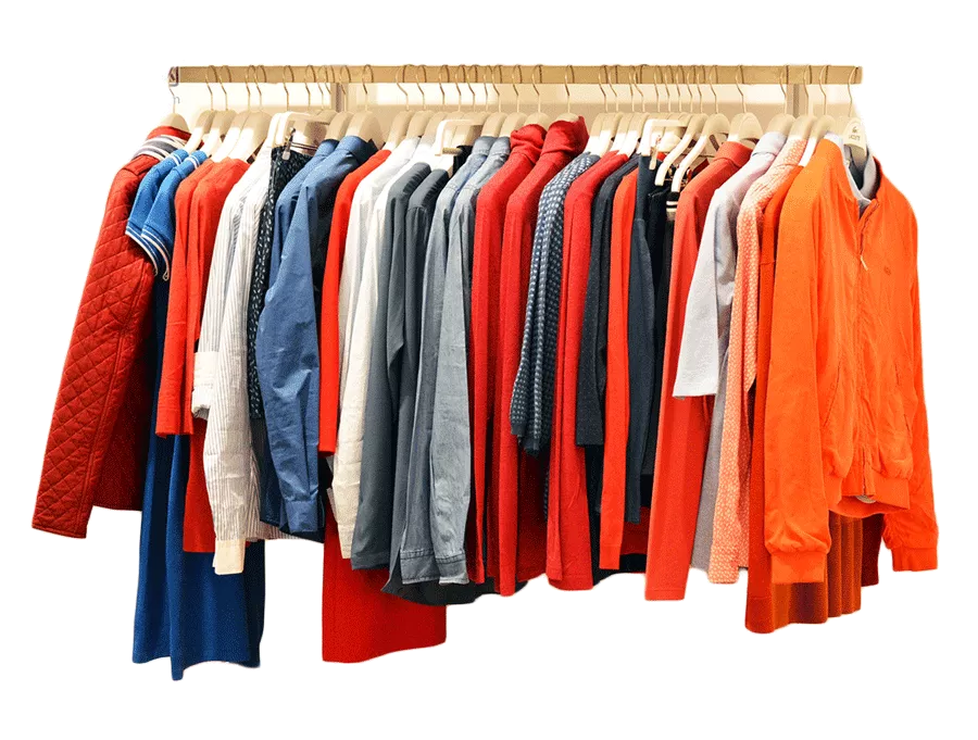 different clothes hanged on a clothing rack