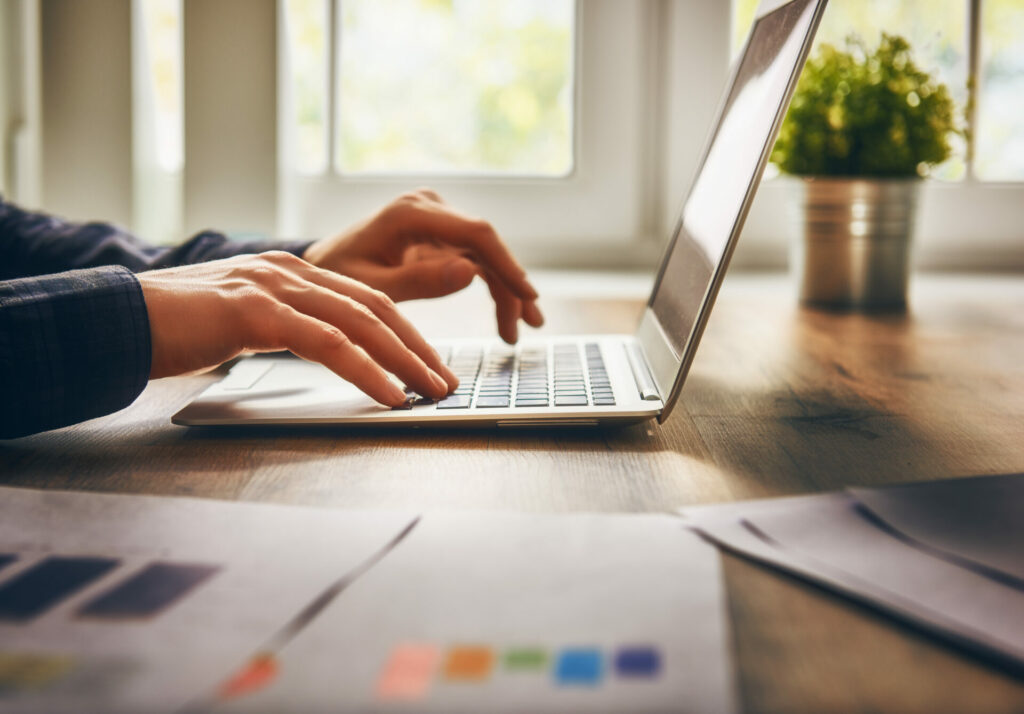 businessman using laptop computer sitting working office.