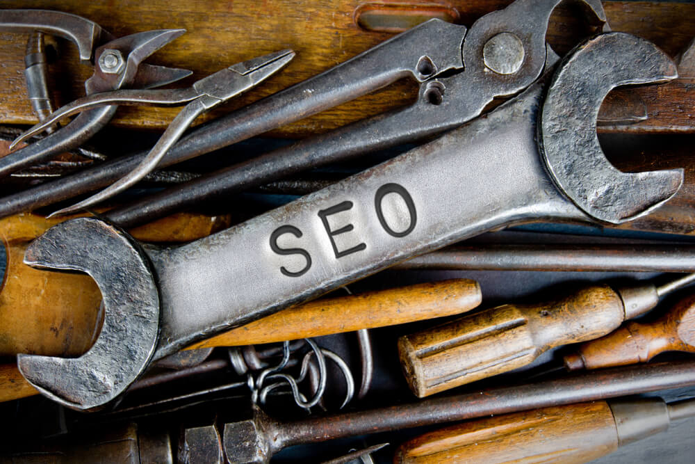 SEO letters imprinted on wrench with other tools