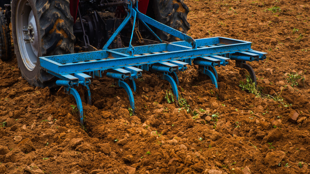 Blue harrow tilling healthy soil
