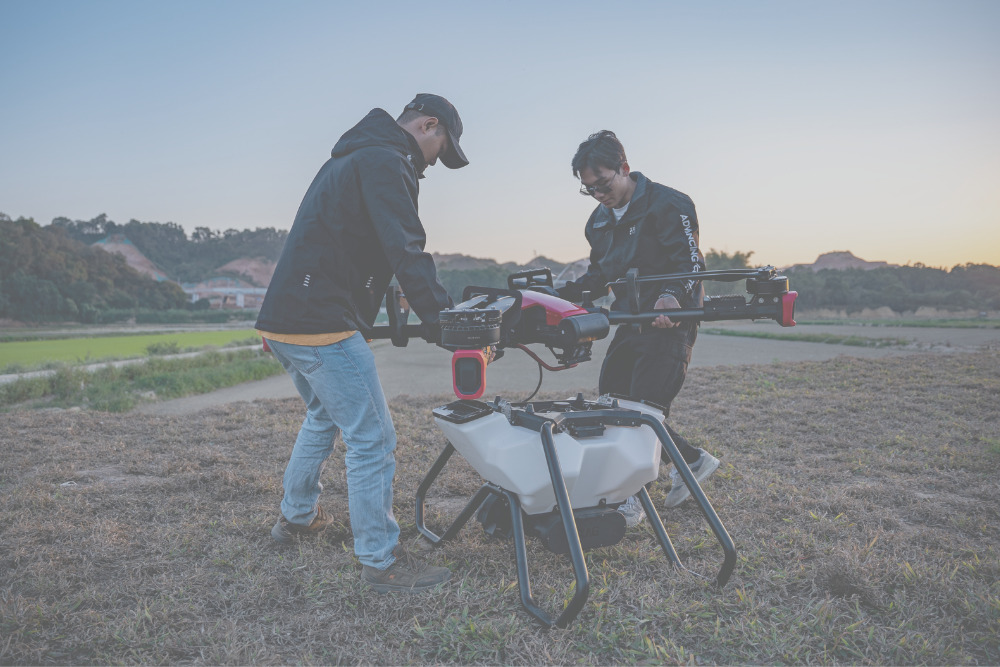 2 men flying a drone