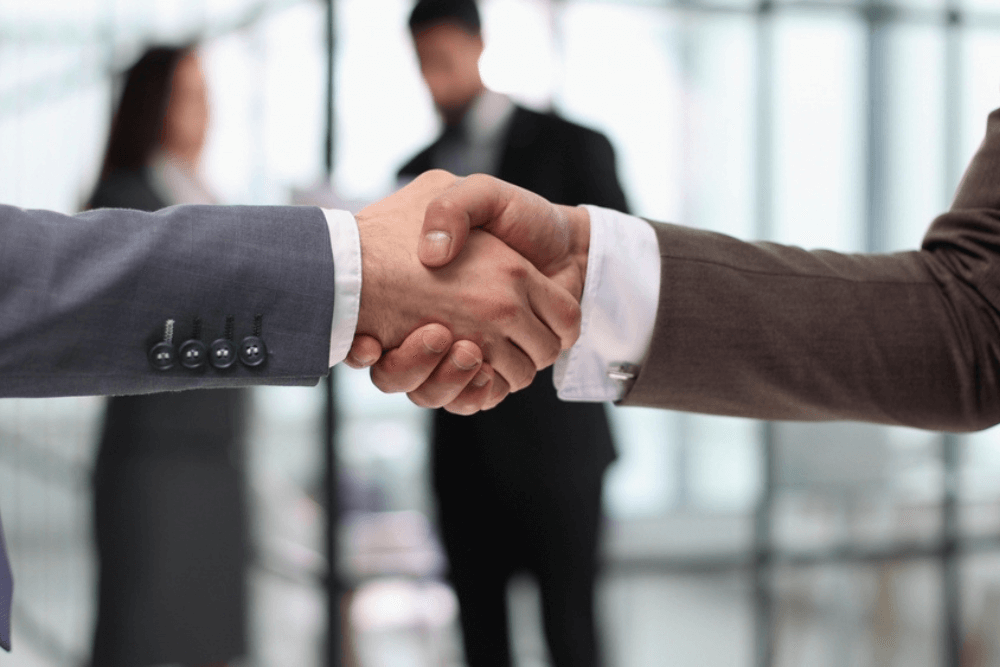 close-up of handshake of business partners after closing a deal